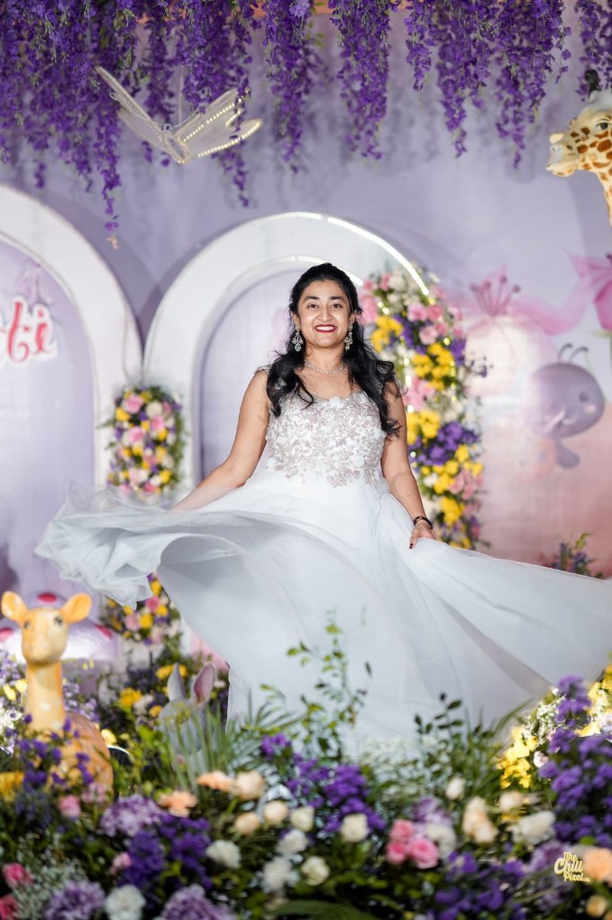 Raaga — white embellished gown portrait